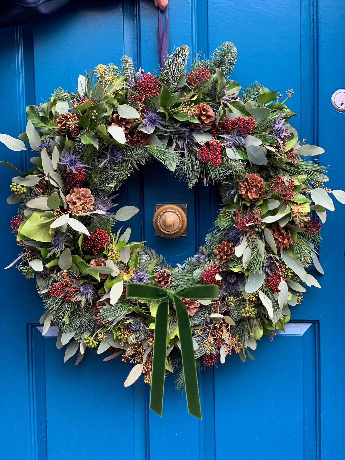 Glencoe wreath with narrow green velvet bow