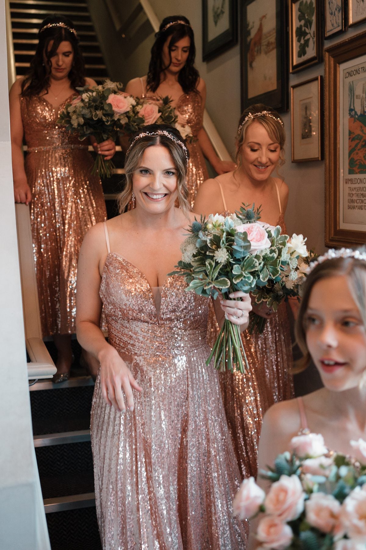 Bridesmaids carrying blush and ivory bouquets by Gardenia of London