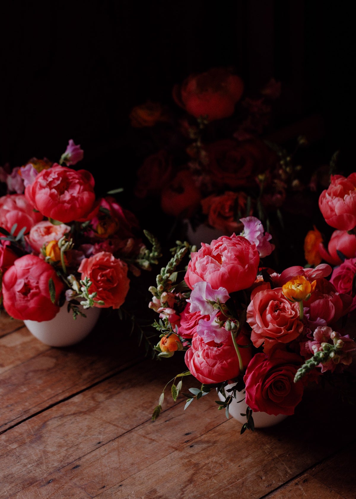 Close-up of pink and peach flowers by Gardenia of London