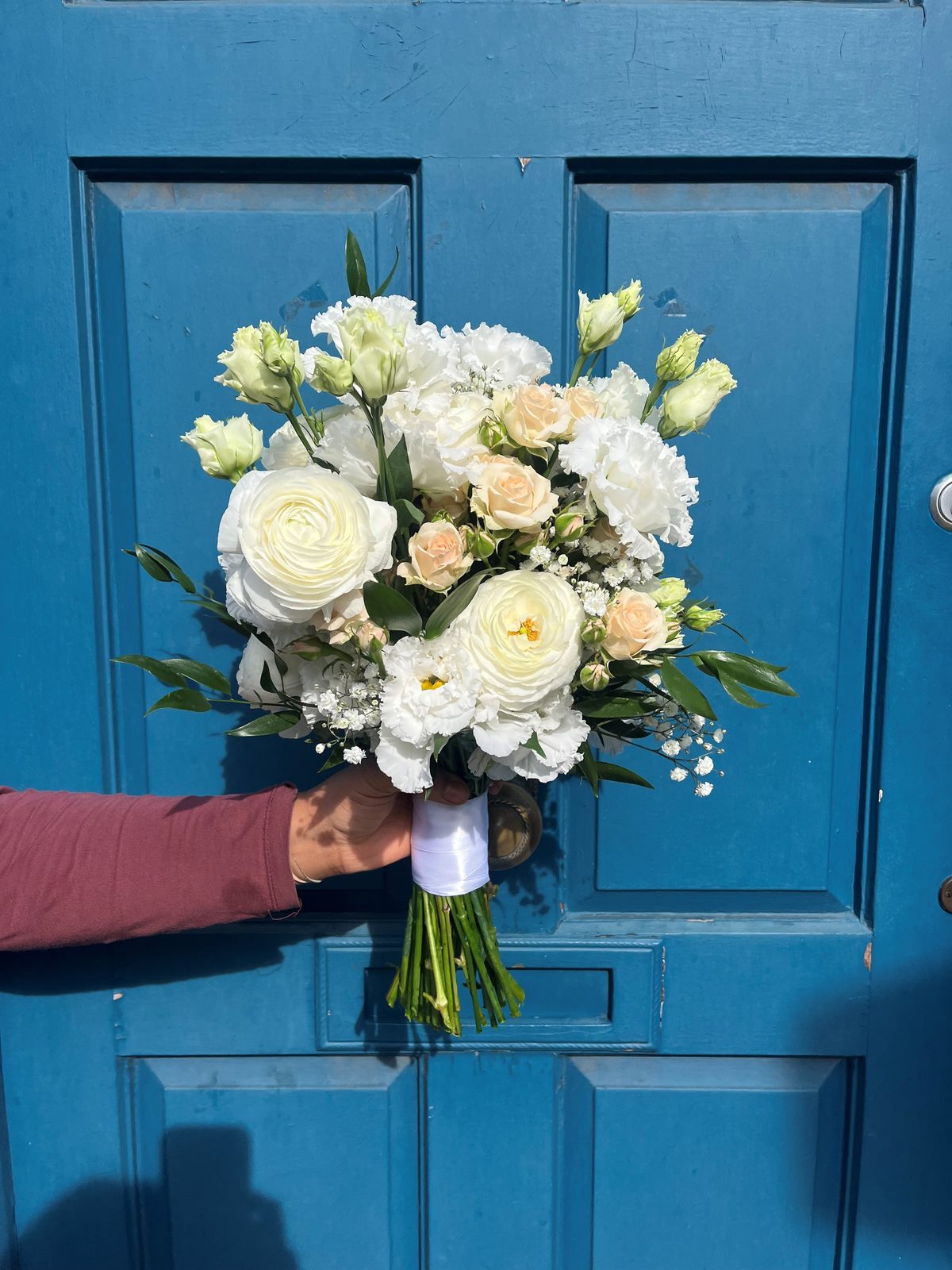 White and pale peach bridal bouquet by Gardenia of London