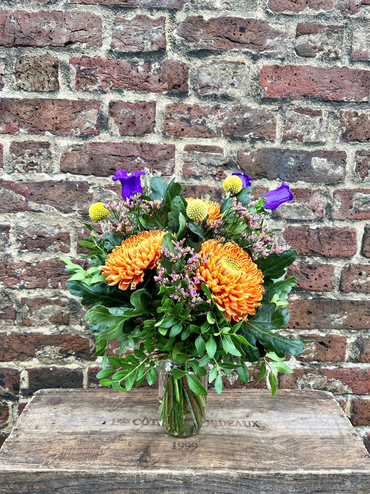 Seasonal Bold & Bright jam jar arrangement